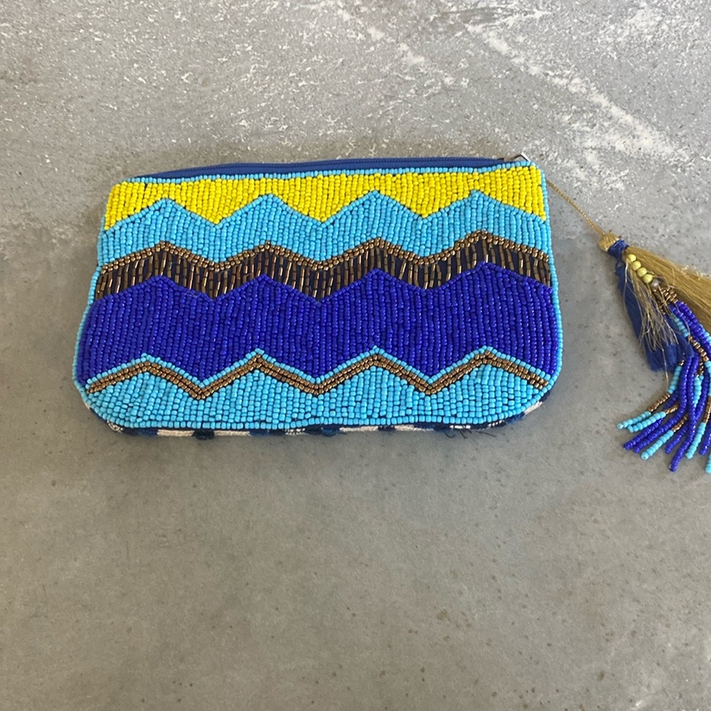 Pending. NWOT Anthropologie beaded clutch purse